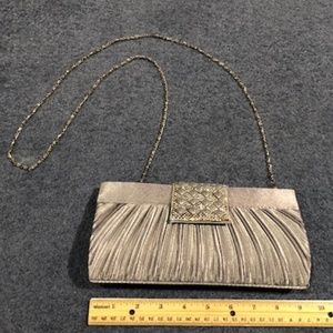 Silver fabric purse with rhinestone clasp
